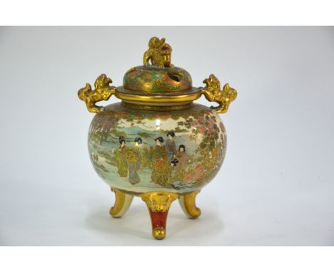 A Satsuma koro with pierced domed cover and karashishi finial; decorated in gilt and colours with groups of Yamato Nadeshko, 
