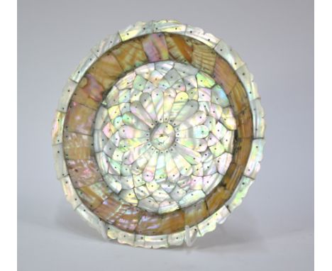 A Gujarati or Indo-Portuguese style circular dish, decorated on both the obverse and reverse with carved and pinned mother-of