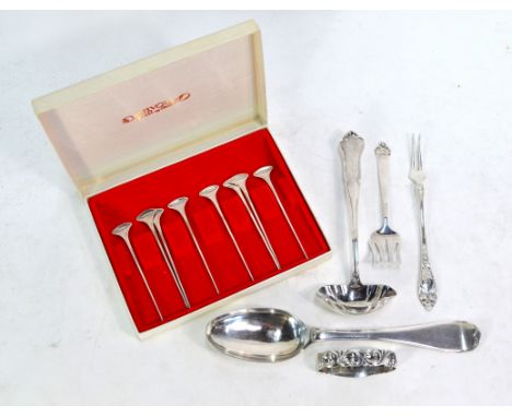 A set of eight Norwegian 830 grade Nils Hansen design cocktail sticks, to/w a sauce ladle, pickle fork, sardine server, napki