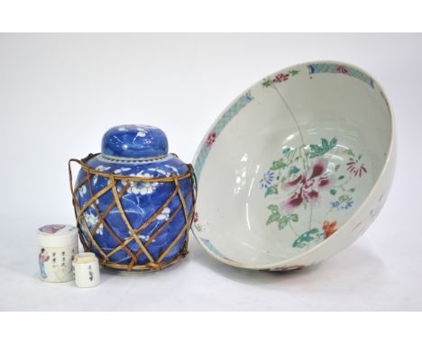 A famille rose punch bowl, decorated with floral designs, 27 cm diameter; two small famille rose cylindrical vessels, decorat