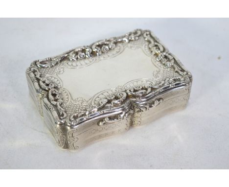 An early Victorian Nathaniel Mills large snuff box of cartouche form with engine turned decoration and gilt interior, the und