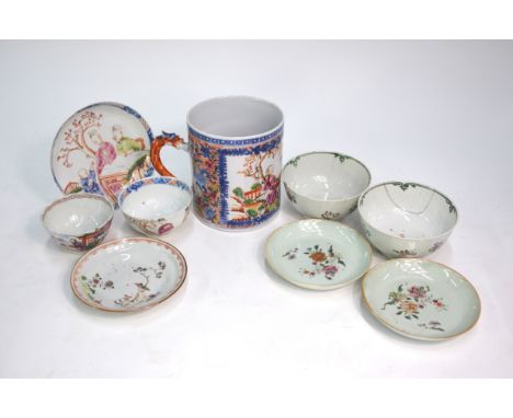 A famille rose tankard of typical cylindrical form, decorated with four Manchu/Chinese figures on a garden verandah, 12.5 cm 
