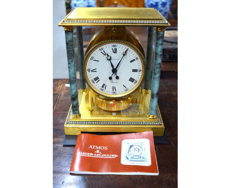 A Jaeger Le Coutre Atmos clock model no 282663 with green marbled pillasters c/w manual (no box, no papers)Good condition, ru