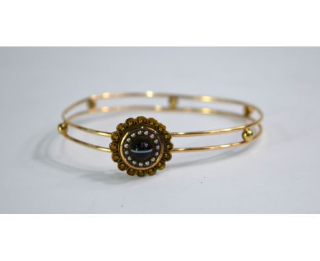 A Victorian two row gold wire work bangle, having cabochon banded agate and half pearl clasp, approx 9g all in