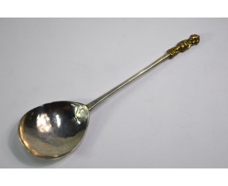 A Charles I silver Buddha knop spoon with gilt finial on hexagonal stem engraved with fleur de lys motif, the back of the bow