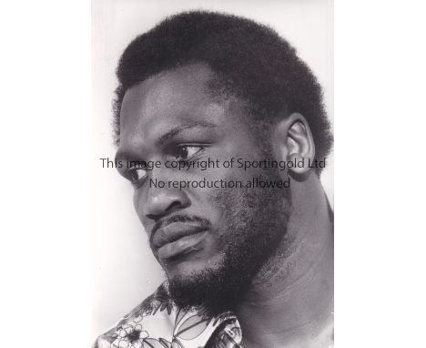 JOE FRAZIER PRESS PHOTOGRAPHS       Twenty one press photographs, with the majority being black &amp; white, of various sizes