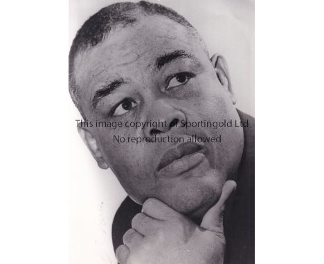 JOE LOUIS PRESS PHOTOGRAPHS       Twenty three press photograph, with the majority being black &amp; white, of various sizes.