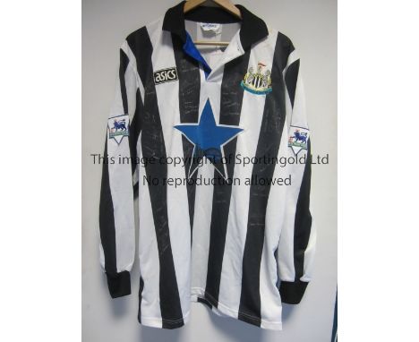 NEWCASTLE UNITED        A home black &amp; white long sleeve Asics shirt 1993-1995 with a blue star shirt sponsor on the fron