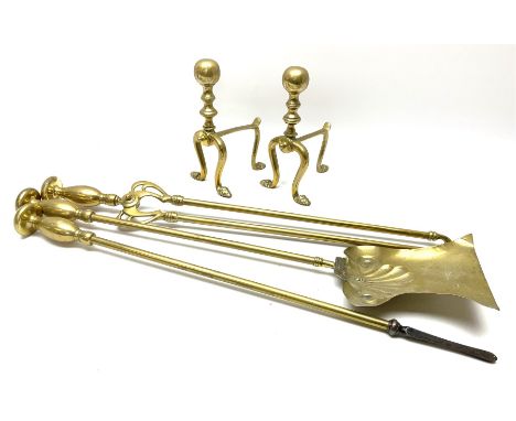 Set of three brass long-handled fire tools, the tongs with Art Nouveau mounts; and a pair of brass fire-dogs with spherical t