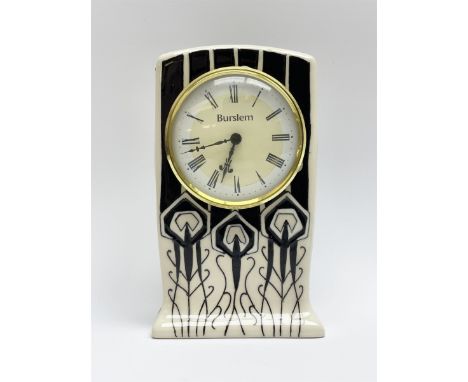 A Moorcroft mantle clock, decorated in the Peacock parade pattern, by Nicola Slaney, with impressed and painted marks beneath