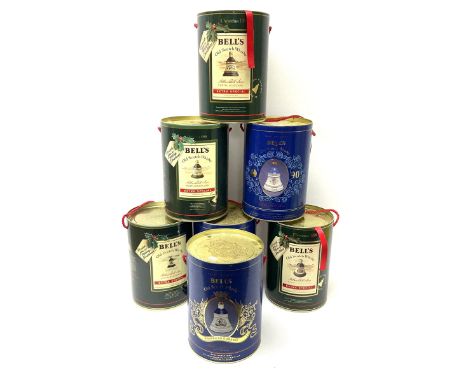 Seven Bell's Old Scotch Whisky ceramic decanters comprising Christmas 1988, 1989, 1990 and 1991 and three Royal Decanters 'Pr