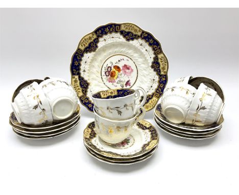 19th century teawares, comprising eight tea cups, two further cups, eleven saucers and a cake plate, decorated with central f