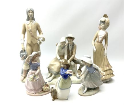 A group of six Spanish porcelain figures, including Nao a girl with a cake and puppy, H20cm, Nadal girl with flowers, H22cm e