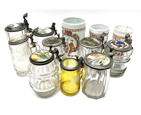 Collection of glass tankards, including three milk glass tankards painted with line boarders and flower sprigs and figures,  