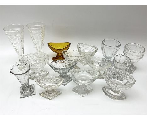 A group of 19th century drinking glasses, to include two examples with lemon squeezer base, a pair with cut and faceted funne