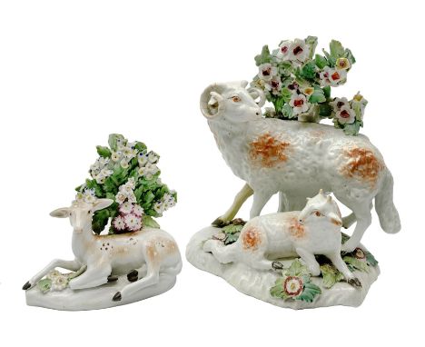 18th century Derby porcelain group, modelled as a ram standing before bocage above a recumbent lamb, upon flower encrusted ba
