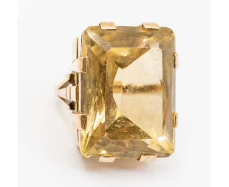 A large 9ct gold and quartz dress ring, rectangular faceted stone approx 25 x 20mm, eight claw setting to fancy mount, size K