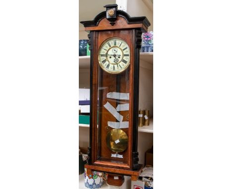 A Vienna wall clock with 7" 2 piece dial, with two train 8 day weight driven movement, subsidiary seconds dial, chiming on a 