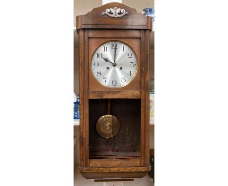 A 1930's 8 day wall clock