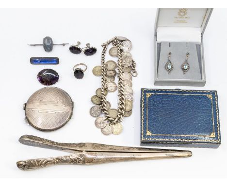 A collection of jewellery to include a silver brooch, blue topaz earrings drops, butterfly wing brooch, AF glass is broken, B