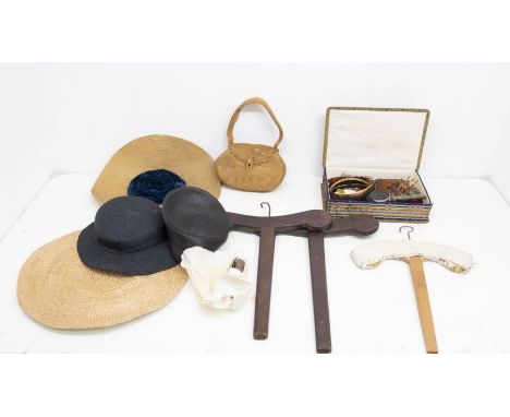 A flat, basket weave Italian sunhat. Late Edwardian to mid-1920s.A hat with a woven straw brim and a small velvet midnight bl