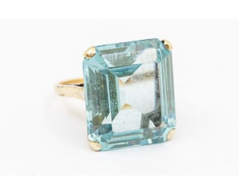 A retro style synthetic spinel and 9ct gold dress ring, comprising an emerald cut synthetic spinel, measuring approx 16 x 18m