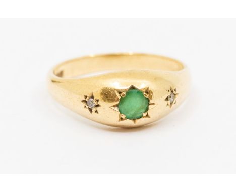 An Victorian style emerald and diamond three stone 9ct gold ring, comprising a star set round cut emerald to the centre with 