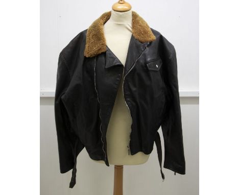 A large black suede jacket with beadwork in the various colours of the red Indians, in North America, extensive embellishment