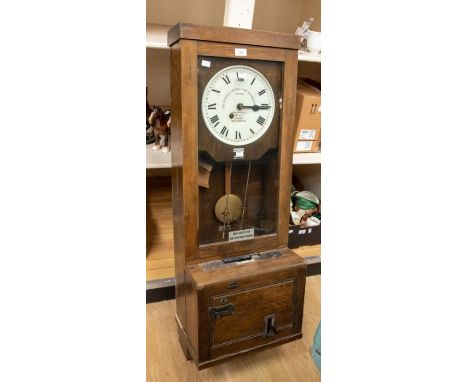 An early 20th Century Gledhill Brook time recorder/clocking in machine, oak cased, number 14670/75464