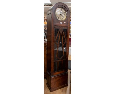 A 1930's Art Deco grandmother clock, arched shaped with Deco detail, Arabic numerals