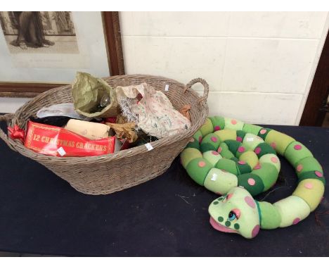 A vintage laundry basket containing mid 20th Century Christmas decorations