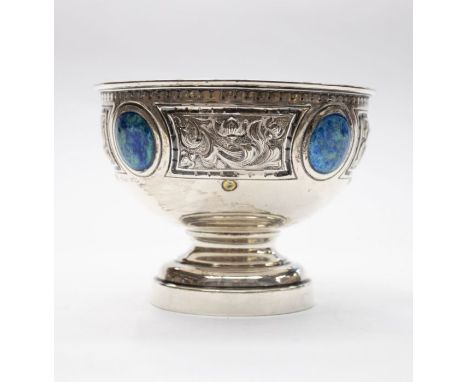 An Arts & Crafts silver and enamel bowl, by Vaughton & Sons Birmingham 1907, chased scrolling iris decoration with blue/green