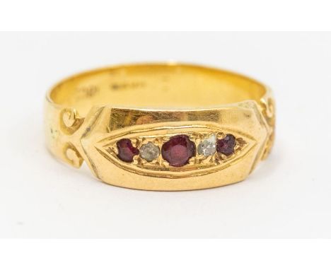 A Victorian ruby and diamond 18ct gold ring, scrolled shoulders, size M1/2, total gross weight approx 3gms Further details: g