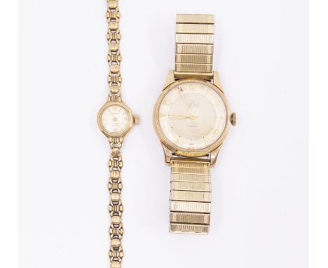 A gents 9ct gold Smiths wristwatch, cream dial with applied arrow and number markers, case approx 32mm, on a later plated exp