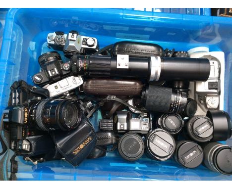 Collection of Minolta 20th century automatic cameras including mixed collection of lenses, cased and uncased