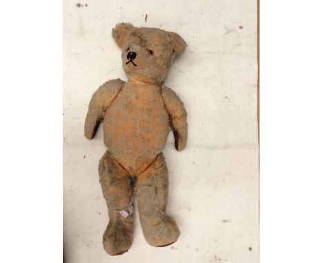 Mid 20th century teddy bear, possibly chad valley, straw filled, hole to right foot/paw, hole to underside left ear, well lov