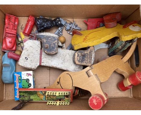 Vintage tinplate, wooden, plastic toy collection to include dogs on wheels, die cast aircraft, Rolo Boko character boards by 