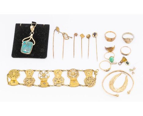 A collection of 9ct gold jewellery including a pair of emerald and 9ct gold studs, along with 9ct gold stick pins, including 