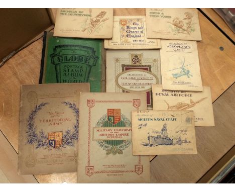 Collection of Joh Player cigarette cards in albums complete, mostly military along with globe stamp album