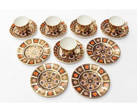 Four Royal Crown Derby 1128 side plates, along with five 1128 Imari teacups and saucers