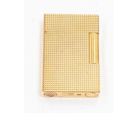 A St Dupont French gold plated lighter, textured design, size approx 55 x 38mm. - NO POSTAGE AVALIABLE FOR THIS LOT -