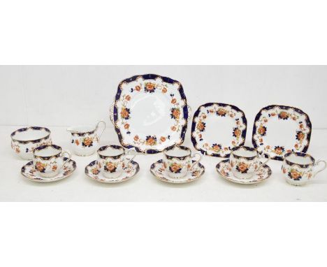 A Royal Albert Crown China pattern no: 7811 twelve piece tea service to include: cups, saucers, plates, 2 cake plates, sugar 