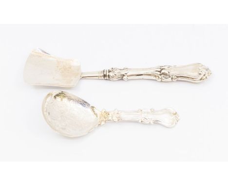 An early Victorian silver large ornate hour glass pattern caddy spoon with shovel shaped bowl, hallmarked by George Unite, Bi