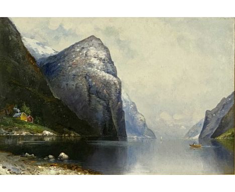 ‡ L. RASMUSSEN oil on canvas - fjord landscape with figure in boat, signed lower left, 41 x 61cmsProvenance: private collecti