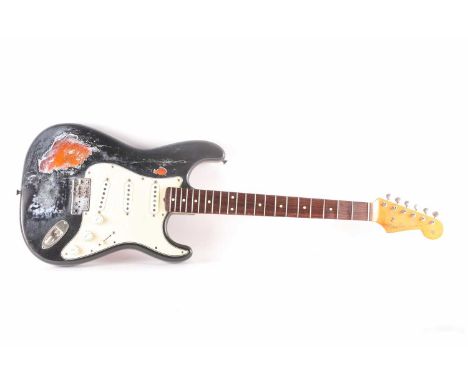 A Japanese Fender Stratocaster electric guitar (AF) serial number L027826 (1991-1992)Condition report: The guitar has had a h