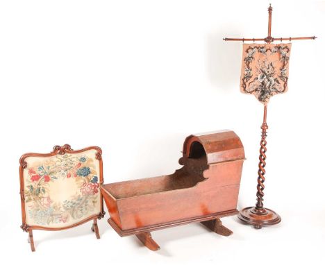 A large 19th century pitch pine crib, on later rocker feet, 94cm long, 71cm high, together with a Victorian pole screen, the 
