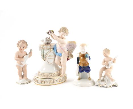 A Meissen porcelain group of Cupid Felicite Couronnee. Cupid stands near a pair of doves standing on a plinth below a wreath 