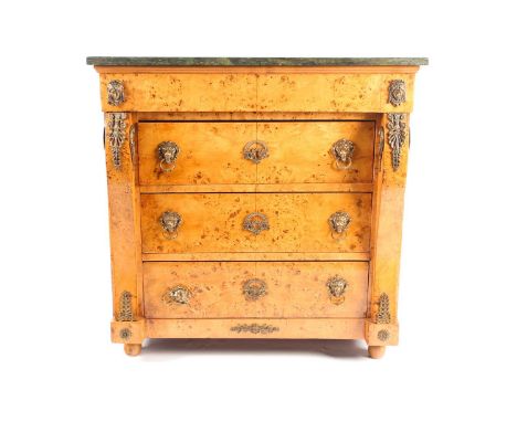 A French Empire design marble-topped birdseye maple Pettit commode. Fitted three short drawers with gilt metal mounts through