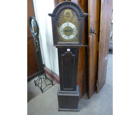 An oak dwarf longcase clock