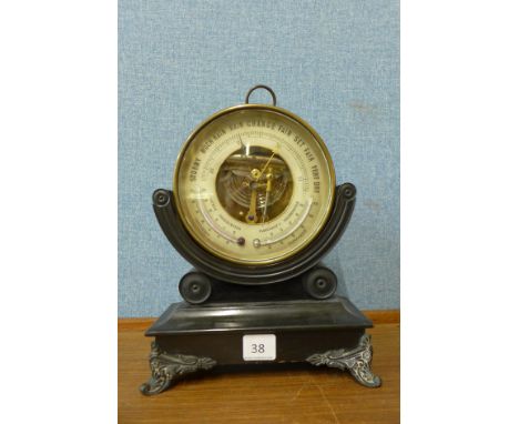 A Victorian barometer on ebonised stand